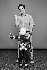 photo of Professor Jan Peters with a robot